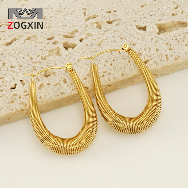 stainless steel U-shaped spring earrings with European and American fashion hollow out design and titanium steel ring earrings