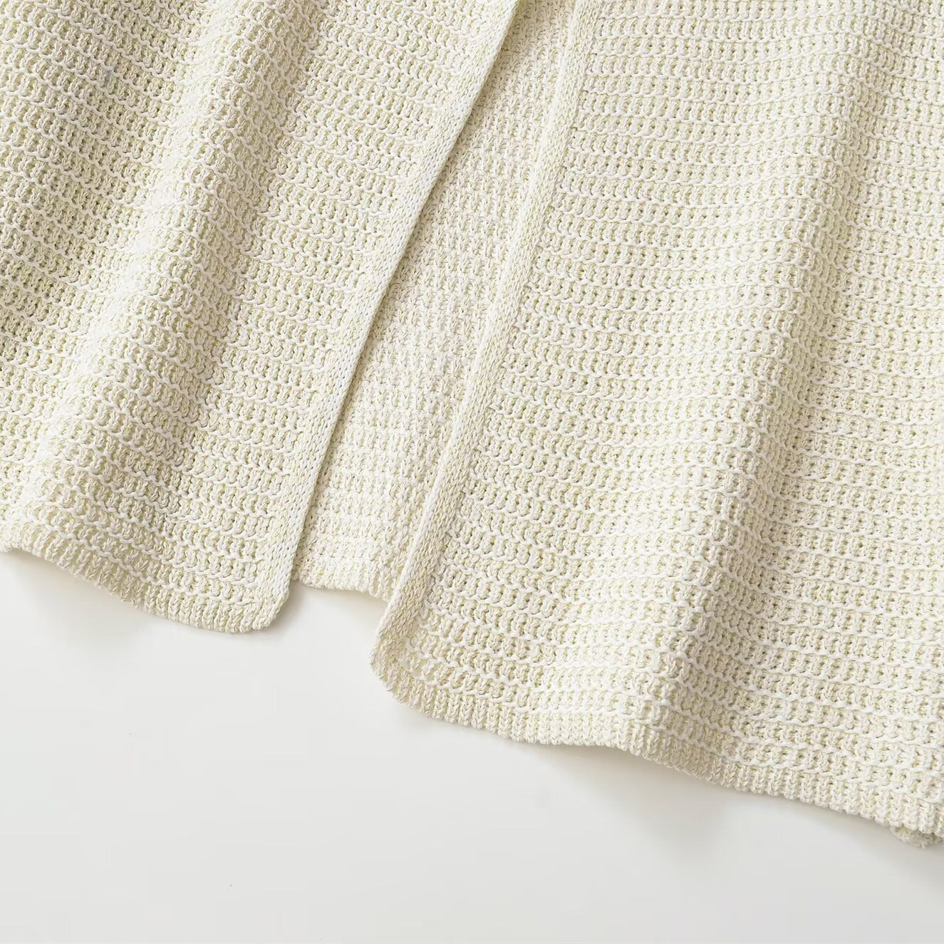 Minimalist metal colored knitted jacket