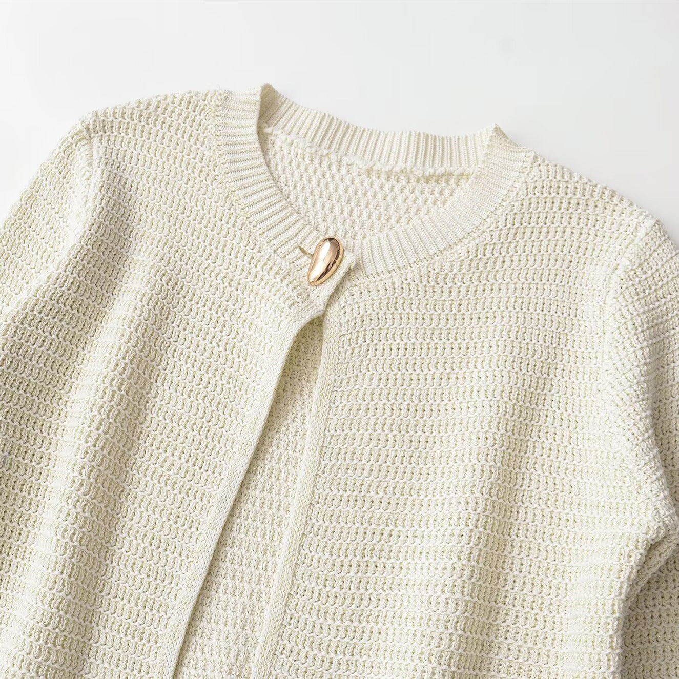 Minimalist metal colored knitted jacket