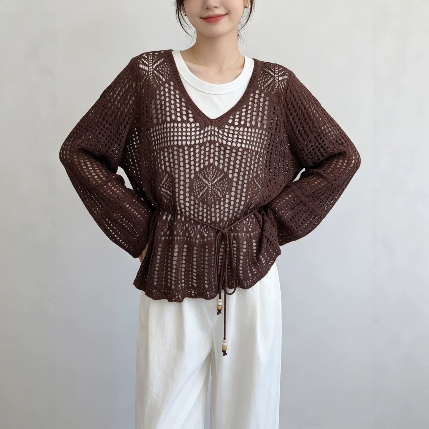 Hollow out V-neck long sleeved top