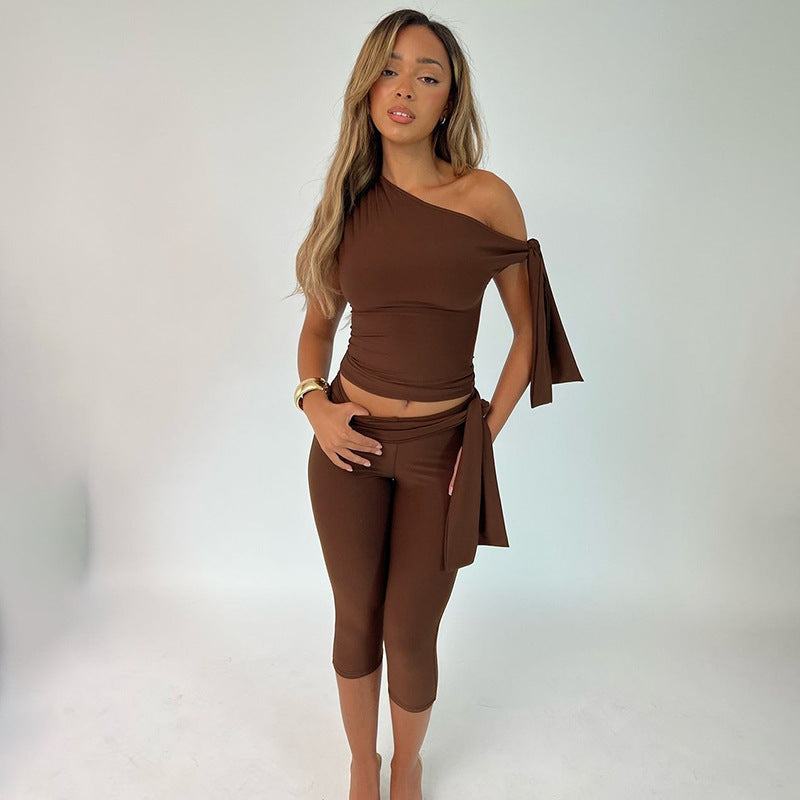 Slant neck solid color sleeveless top slim fit lace up shorts set